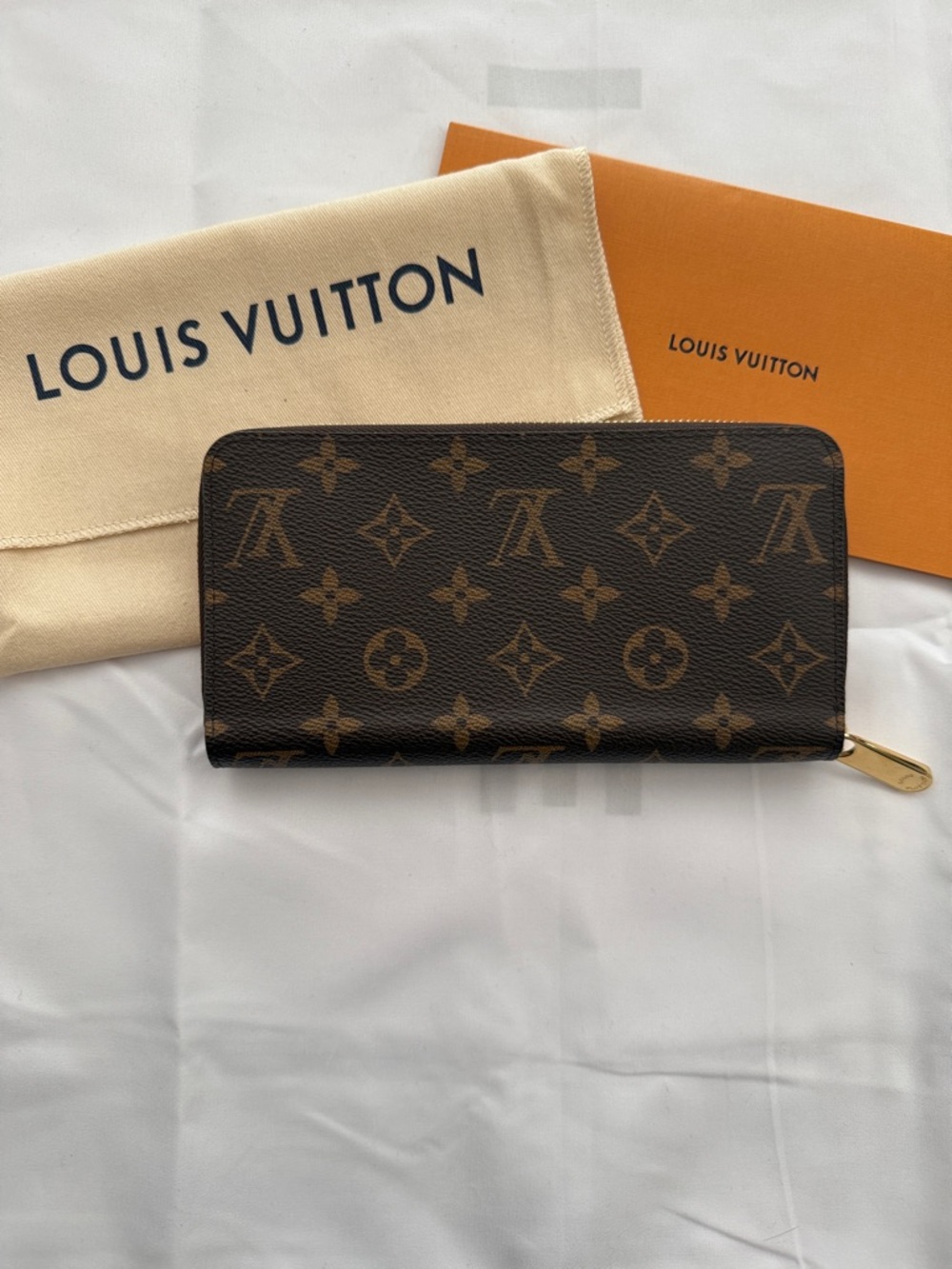 Louis Vuitton Monogram Canvas Zip Around Wallet in Brown